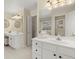 Double vanity bathroom with ample storage at 3669 White Sands Way, Suwanee, GA 30024