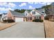 Brick home with 2-car garage and driveway at 3669 White Sands Way, Suwanee, GA 30024