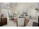 Spacious living room featuring high ceilings, a fireplace, and ample natural light at 3669 White Sands Way, Suwanee, GA 30024