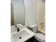 Clean bathroom with sink, toilet and bathtub at 415 Dove Ln, Social Circle, GA 30025