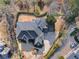 Aerial view of a luxurious home with a large driveway and landscaped grounds at 4720 Cliffside Ct, Marietta, GA 30067