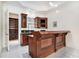 Basement bar with wooden cabinetry and wine storage at 4720 Cliffside Ct, Marietta, GA 30067