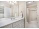 Clean bathroom with white vanity, shower, and tiled floor at 4720 Cliffside Ct, Marietta, GA 30067