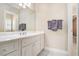 Bathroom with white vanity, mirror, and grey towels at 4720 Cliffside Ct, Marietta, GA 30067