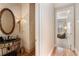 Elegant powder room with ornate mirror and dark vanity at 4720 Cliffside Ct, Marietta, GA 30067