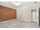 Bedroom with cork feature wall and access to bathroom and hallway at 4720 Cliffside Ct, Marietta, GA 30067