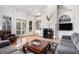 Gathering room with fireplace, built-in shelving and hardwood floors at 4720 Cliffside Ct, Marietta, GA 30067