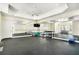 Large home gym with mirrored walls and exercise equipment at 4720 Cliffside Ct, Marietta, GA 30067