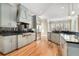 Modern kitchen with light blue cabinets, granite countertops, and stainless steel appliances at 4720 Cliffside Ct, Marietta, GA 30067