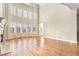 Living room with hardwood floors and wall of windows at 4720 Cliffside Ct, Marietta, GA 30067