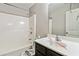 Clean bathroom with vanity, toilet and shower/tub combo at 654 Ocean Ave, Canton, GA 30114