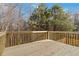 Spacious wooden deck overlooks a private wooded area at 654 Ocean Ave, Canton, GA 30114