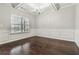 Formal dining room with hardwood floors and wainscoting at 654 Ocean Ave, Canton, GA 30114