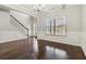 Formal dining room with hardwood floors and wainscoting at 654 Ocean Ave, Canton, GA 30114