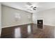 Spacious living room with hardwood floors and fireplace at 654 Ocean Ave, Canton, GA 30114