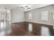 Open living room with hardwood floors and kitchen view at 654 Ocean Ave, Canton, GA 30114