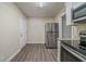 Eat-in kitchen with stainless steel appliances and ample cabinet space at 1888 Cindy Dr, Decatur, GA 30032