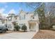 Two-story home with a covered porch and landscaping at 6691 Sunset Hills Blvd, Rex, GA 30273