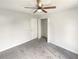 Simple bedroom with ceiling fan and closet at 1535 Valley Club Dr, Lawrenceville, GA 30044