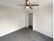 Simple bedroom with ceiling fan and closet at 1535 Valley Club Dr, Lawrenceville, GA 30044