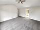 Spacious bedroom with carpeted floors and ceiling fan at 1535 Valley Club Dr, Lawrenceville, GA 30044