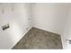 Laundry room with shelving and vinyl flooring at 1535 Valley Club Dr, Lawrenceville, GA 30044