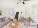 Virtually staged living room with comfy sofas and a coffee table at 1535 Valley Club Dr, Lawrenceville, GA 30044
