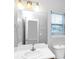 Bathroom featuring a large mirror over a white sink and vanity with natural light from the window at 1580 Mary George Nw Ave, Atlanta, GA 30318