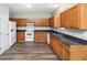 Well-equipped kitchen featuring a white refrigerator and plenty of cabinet space at 1580 Mary George Nw Ave, Atlanta, GA 30318