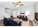 Inviting living room with modern furniture and decor, leading to the staircase at 1580 Mary George Nw Ave, Atlanta, GA 30318