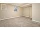 Bright basement room with neutral carpet and large window at 4074 Yeager Rd, Douglasville, GA 30135