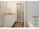 Clean bathroom with white vanity and bathtub at 4074 Yeager Rd, Douglasville, GA 30135