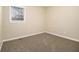 Spacious bedroom with neutral carpet and fresh paint at 4074 Yeager Rd, Douglasville, GA 30135