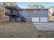 Ranch home with two-car garage and covered porch at 4074 Yeager Rd, Douglasville, GA 30135