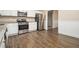 Eat-in kitchen with stainless steel appliances and granite countertops at 4074 Yeager Rd, Douglasville, GA 30135
