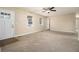 Spacious living room with neutral carpeting and large windows at 4074 Yeager Rd, Douglasville, GA 30135