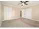Main bedroom with double closets and ceiling fan at 4074 Yeager Rd, Douglasville, GA 30135