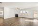 Bright living room with fireplace and hardwood floors at 593 Princeton Elm Place, Lawrenceville, GA 30045