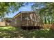 Home exterior showcasing a large deck and fenced backyard at 1102 Fountain Sw Dr, Atlanta, GA 30314