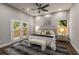 Spacious primary bedroom with hardwood floors and access to a deck at 1102 Fountain Sw Dr, Atlanta, GA 30314