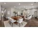 Open dining area with round wooden table and neutral decor at 1102 Fountain Sw Dr, Atlanta, GA 30314