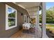 Inviting front porch with seating and a view of the street at 1102 Fountain Sw Dr, Atlanta, GA 30314