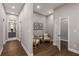 Light and airy hallway with seating area at 1102 Fountain Sw Dr, Atlanta, GA 30314