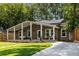 Beautiful home with a large front porch and driveway at 1102 Fountain Sw Dr, Atlanta, GA 30314