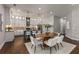 Modern kitchen featuring white cabinets, granite counters, and an island at 1102 Fountain Sw Dr, Atlanta, GA 30314