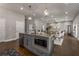 Gray kitchen island with seating and built-in microwave at 1102 Fountain Sw Dr, Atlanta, GA 30314