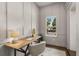 Bright home office featuring built-in shelving and window seat at 1102 Fountain Sw Dr, Atlanta, GA 30314