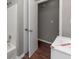 Neutral bathroom with shower-tub combo and white door at 1963 Shannon Ridge Ct, Decatur, GA 30032