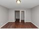 Bedroom featuring neutral paint and hardwood floors providing a bright and airy space at 1963 Shannon Ridge Ct, Decatur, GA 30032