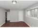 Bedroom featuring a large window and neutral paint providing a bright and airy space at 1963 Shannon Ridge Ct, Decatur, GA 30032